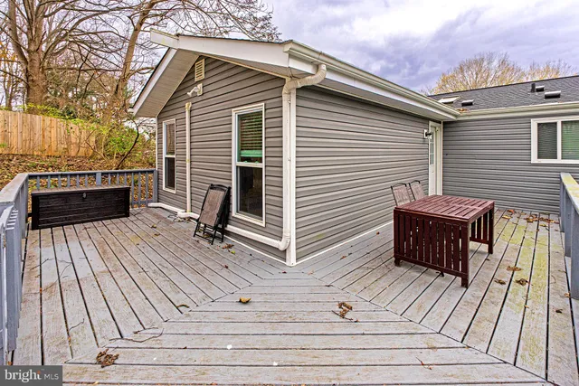 a view of a wooden deck with a patio