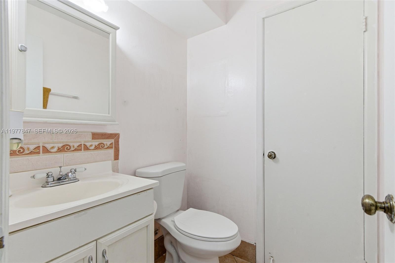 13253 Southwest 110th Terrace, Unit 191 Miami, FL 33186 - Photo 17 of 27 half bathroom