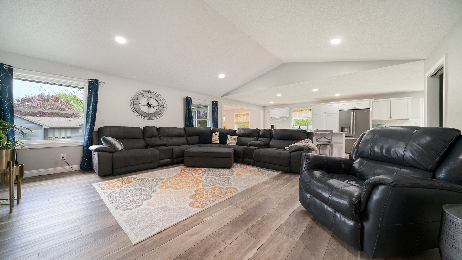 401 Deer Chase Dixon, IL 61021 - Photo 11 of 39 a living room with furniture a couch and paintings on the wall