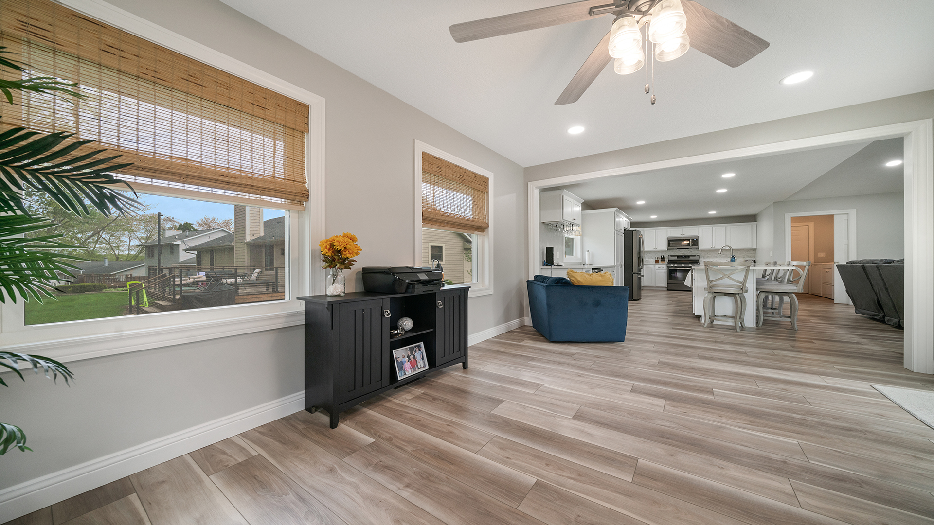 401 Deer Chase Dixon, IL 61021 - Photo 15 of 39 a kitchen with stainless steel appliances kitchen island granite countertop a refrigerator a stove and a wooden floors