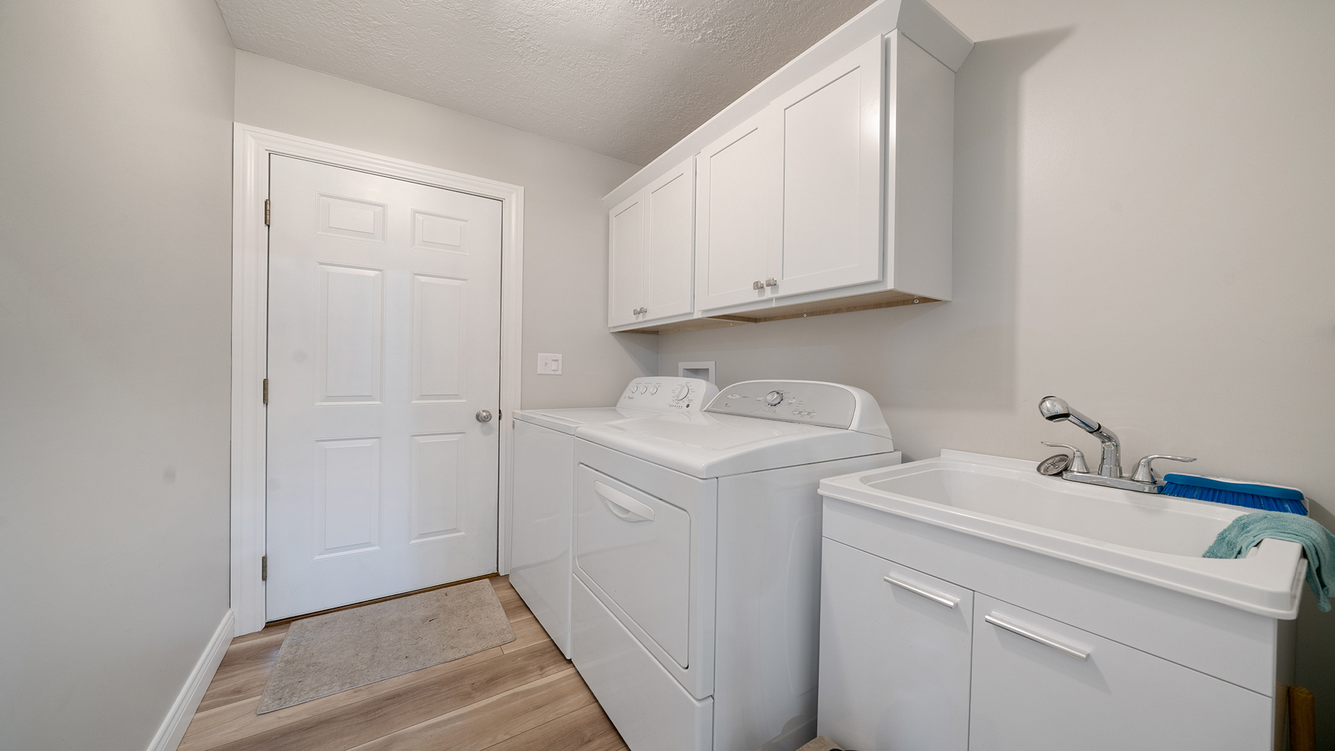 401 Deer Chase Dixon, IL 61021 - Photo 26 of 39 a view of storage and utility room with washer and dryer