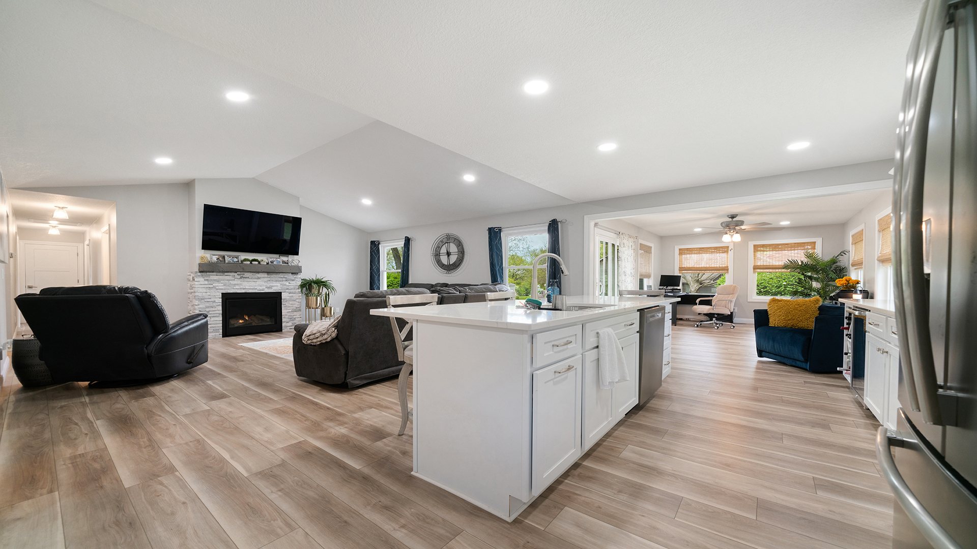401 Deer Chase Dixon, IL 61021 - Photo 3 of 39 a living room with furniture a flat screen tv and kitchen view