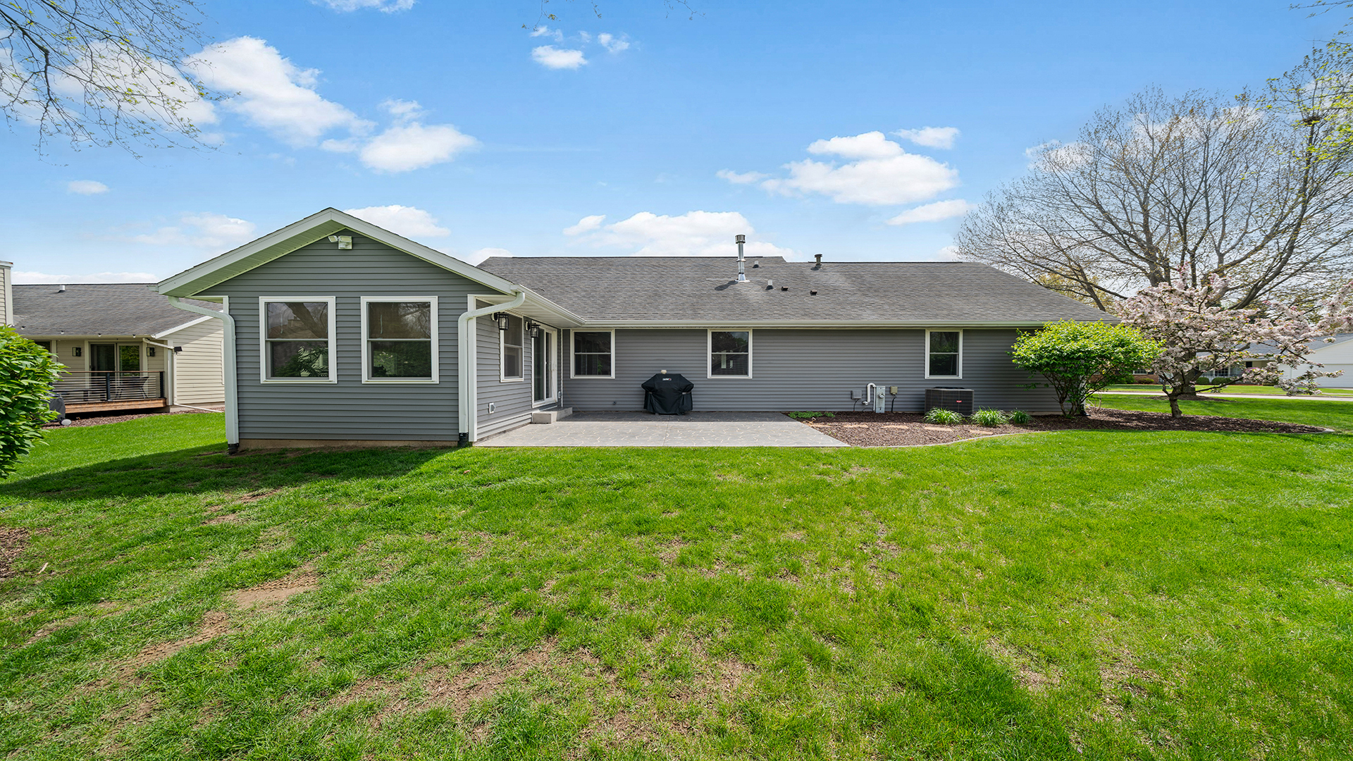 401 Deer Chase Dixon, IL 61021 - Photo 35 of 39 a front view of a house with a garden