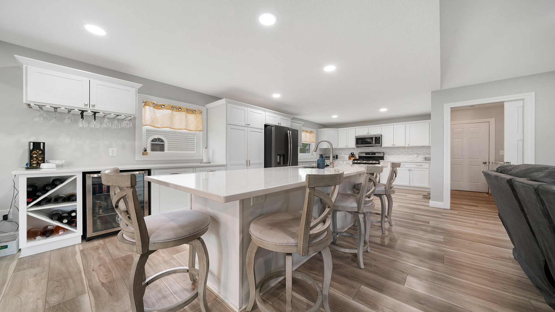 401 Deer Chase Dixon, IL 61021 - Photo 5 of 39 a kitchen with stainless steel appliances kitchen island granite countertop a dining table chairs and granite counter tops