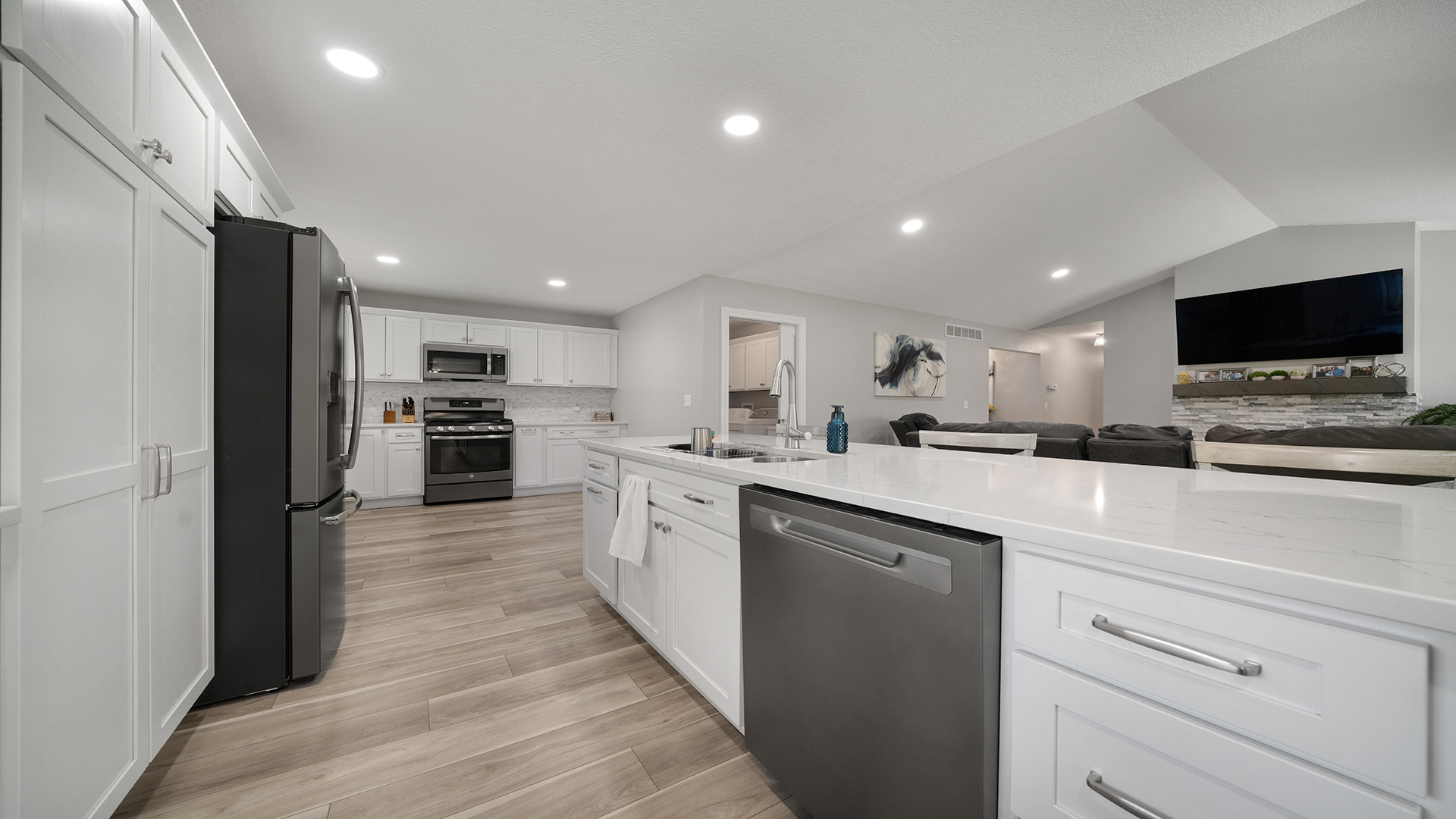 401 Deer Chase Dixon, IL 61021 - Photo 8 of 39 a kitchen with stainless steel appliances kitchen island granite countertop a refrigerator and a stove top oven