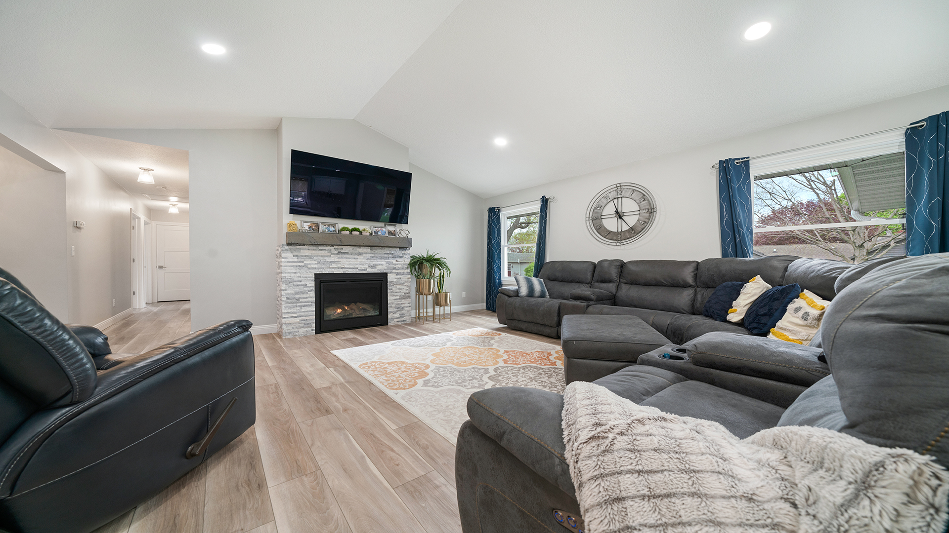401 Deer Chase Dixon, IL 61021 - Photo 10 of 39 a living room with furniture a flat screen tv and a fireplace