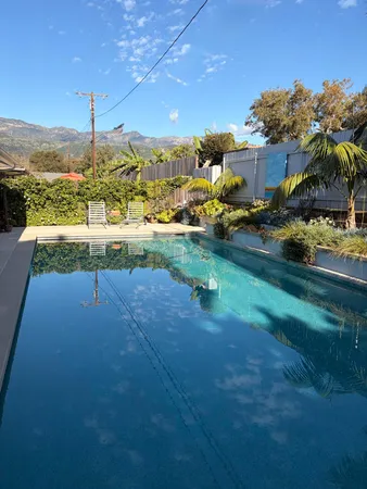 a view of backyard of the house