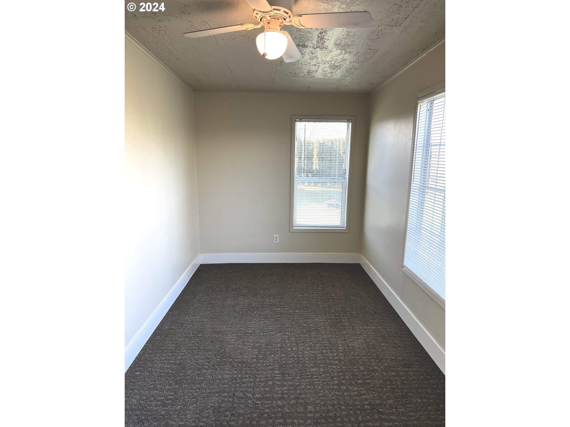 30021 Southeast Orient Drive Gresham, OR 97080 - Photo 22 of 27 a view of an empty room with a window