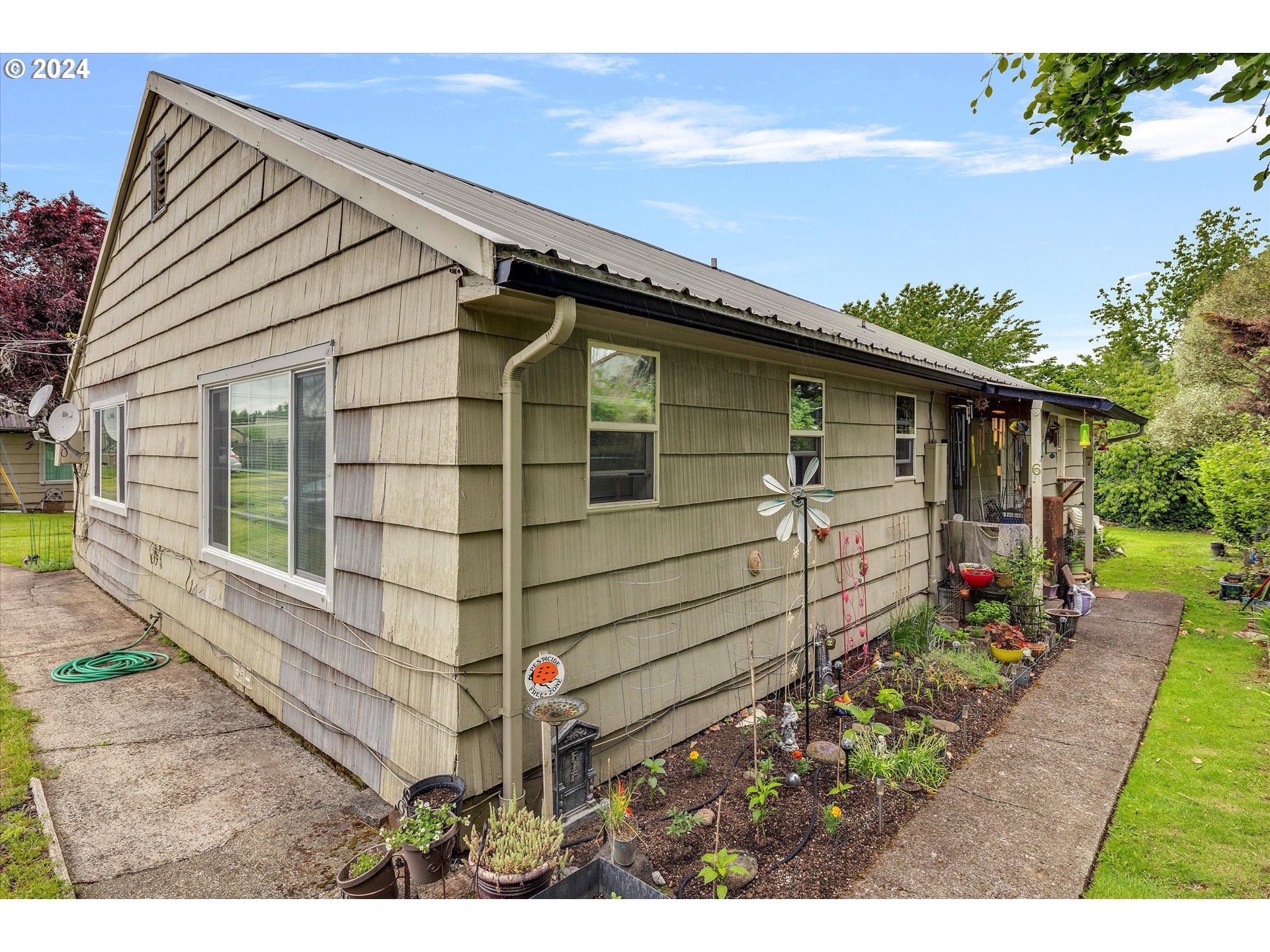 30021 Southeast Orient Drive Gresham, OR 97080 - Photo 10 of 27 a front view of a house with a yard