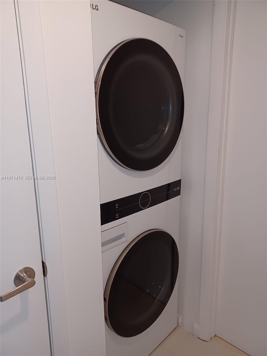 495 Brickell Avenue, Unit 509 Miami, FL 33131 - Photo 9 of 25 a close up view of a washer and dryer