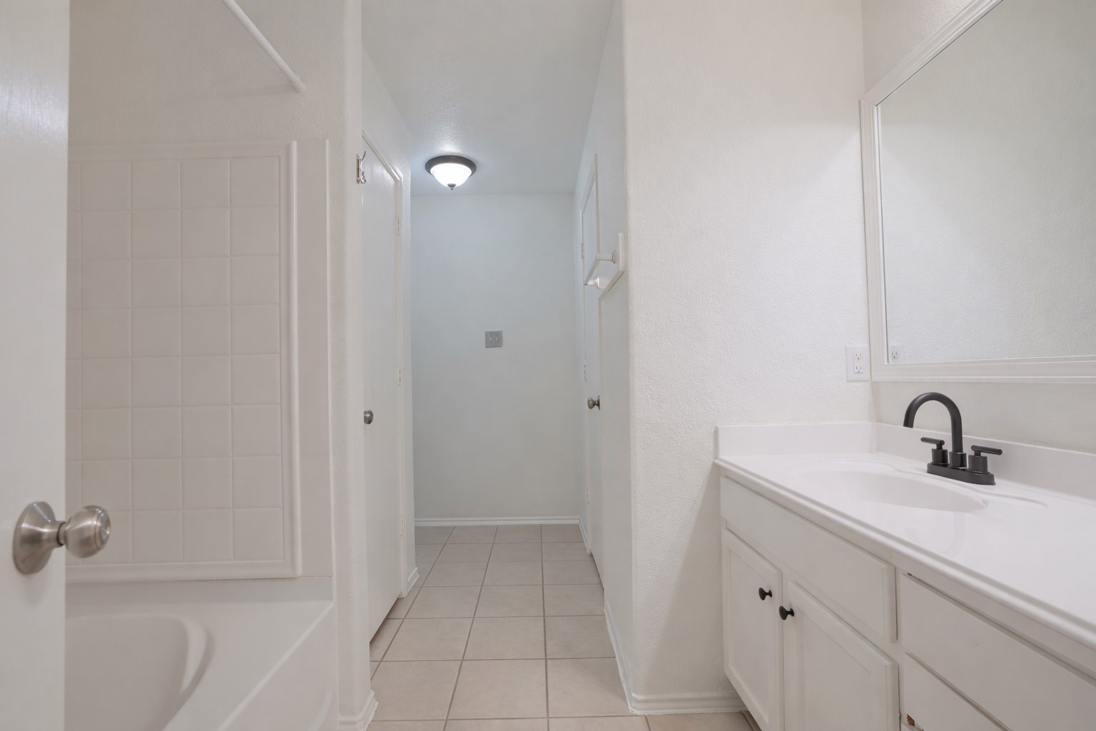7907 Fire Thorn Lane Cypress, TX 77433 - Photo 7 of 17 a bathroom with a sink and a mirror