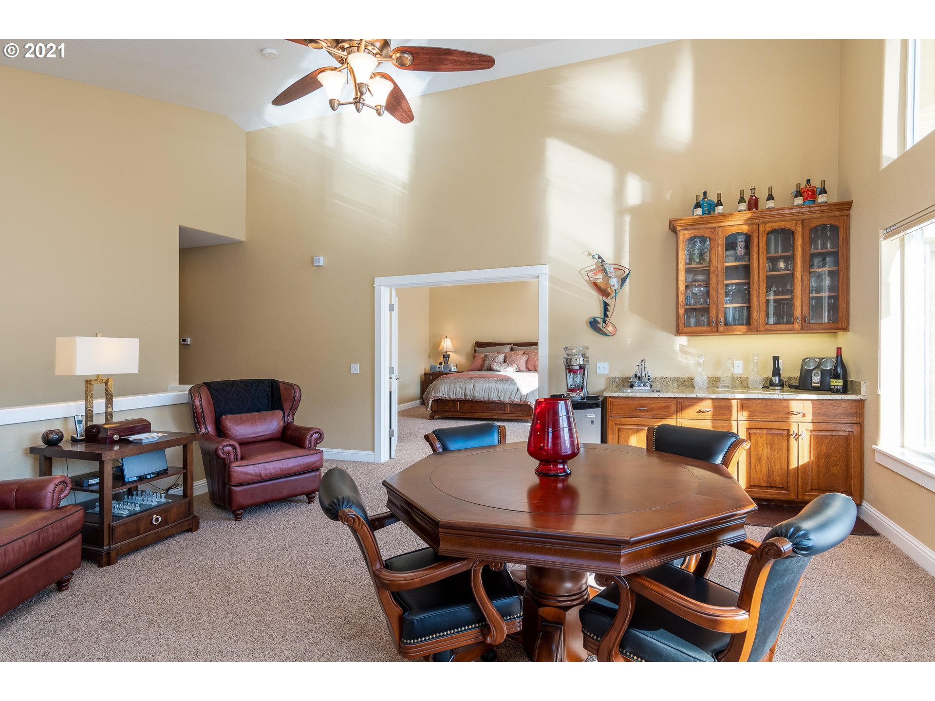 70946 Devore Arm Road Lakeside, OR 97449 - Photo 18 of 48 a view of a dining room with furniture and chandelier
