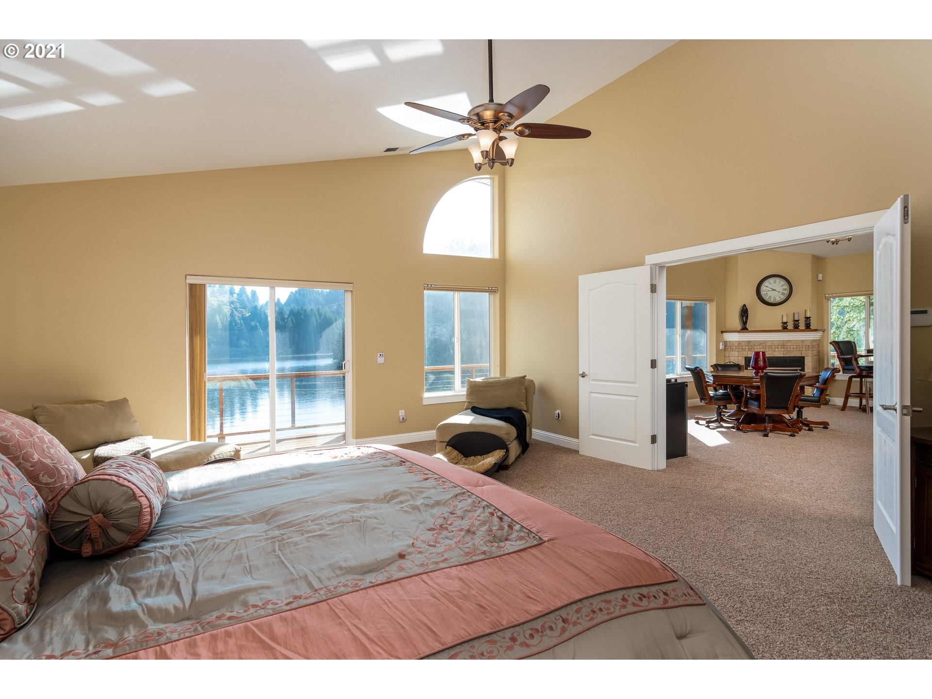 70946 Devore Arm Road Lakeside, OR 97449 - Photo 25 of 48 a bedroom with furniture and a large window