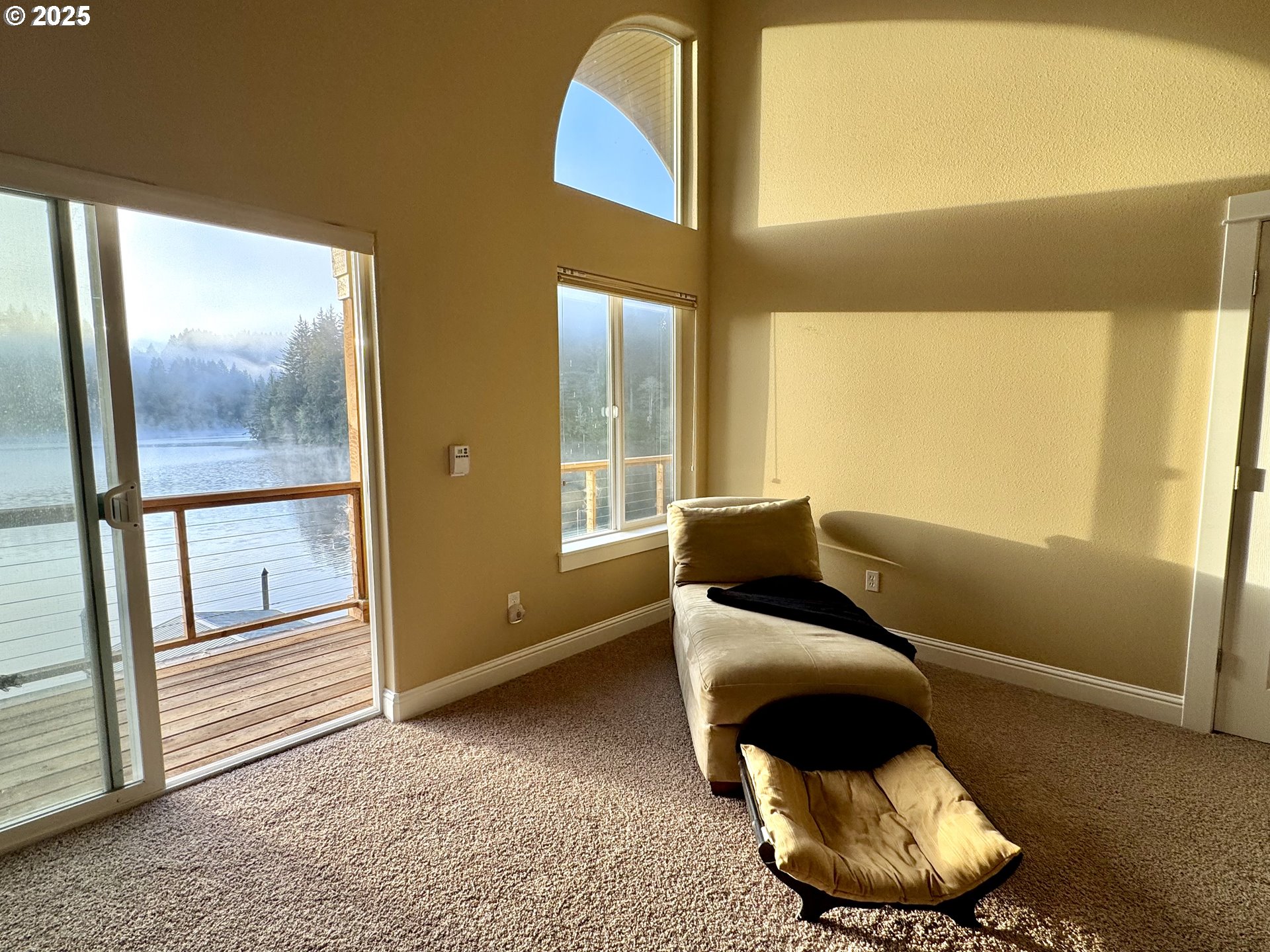 70946 Devore Arm Road Lakeside, OR 97449 - Photo 28 of 48 a living room with furniture and a window