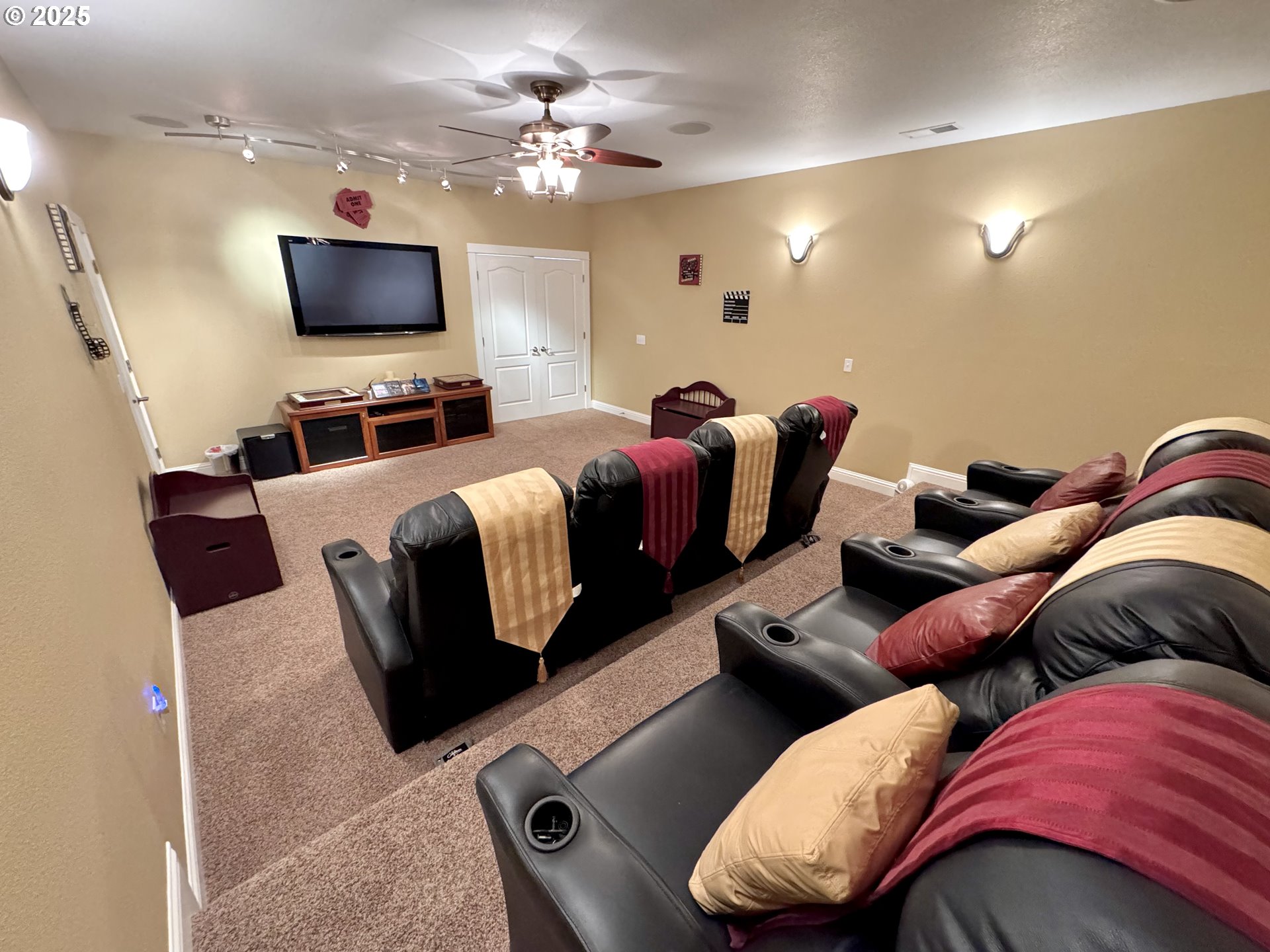 70946 Devore Arm Road Lakeside, OR 97449 - Photo 29 of 48 a living room with furniture and a flat screen tv