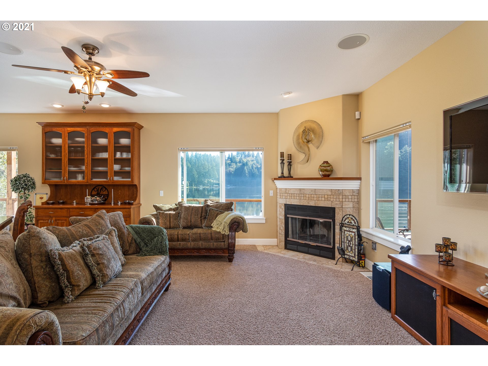 70946 Devore Arm Road Lakeside, OR 97449 - Photo 8 of 48 a living room with furniture and a fireplace