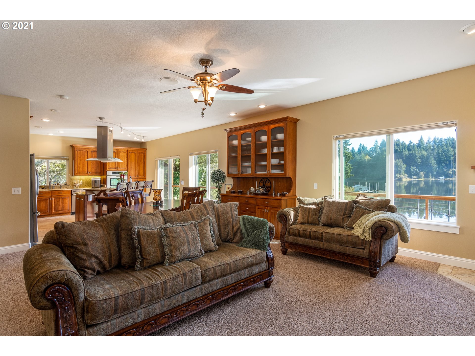 70946 Devore Arm Road Lakeside, OR 97449 - Photo 9 of 48 a living room with furniture and a large window