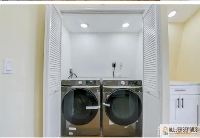 a utility room with dryer and washer