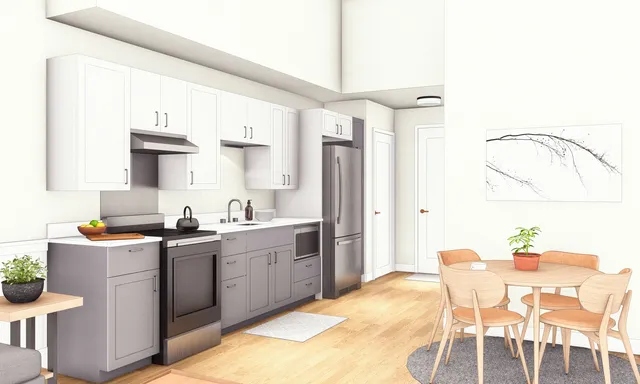 a kitchen with stainless steel appliances a sink a stove a refrigerator dining table and chairs