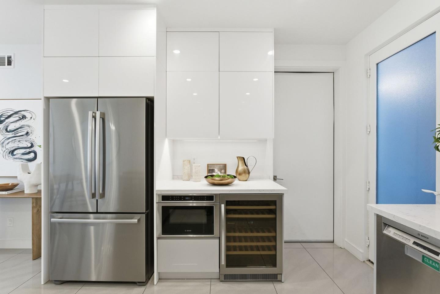 1705 Lawrence Road Santa Clara, CA 95051 - Photo 12 of 45 a kitchen with stainless steel appliances a refrigerator and cabinets