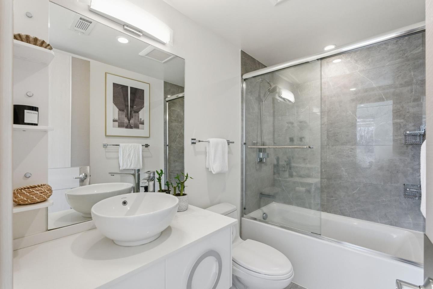 1705 Lawrence Road Santa Clara, CA 95051 - Photo 18 of 45 a bathroom with a granite countertop sink toilet and shower