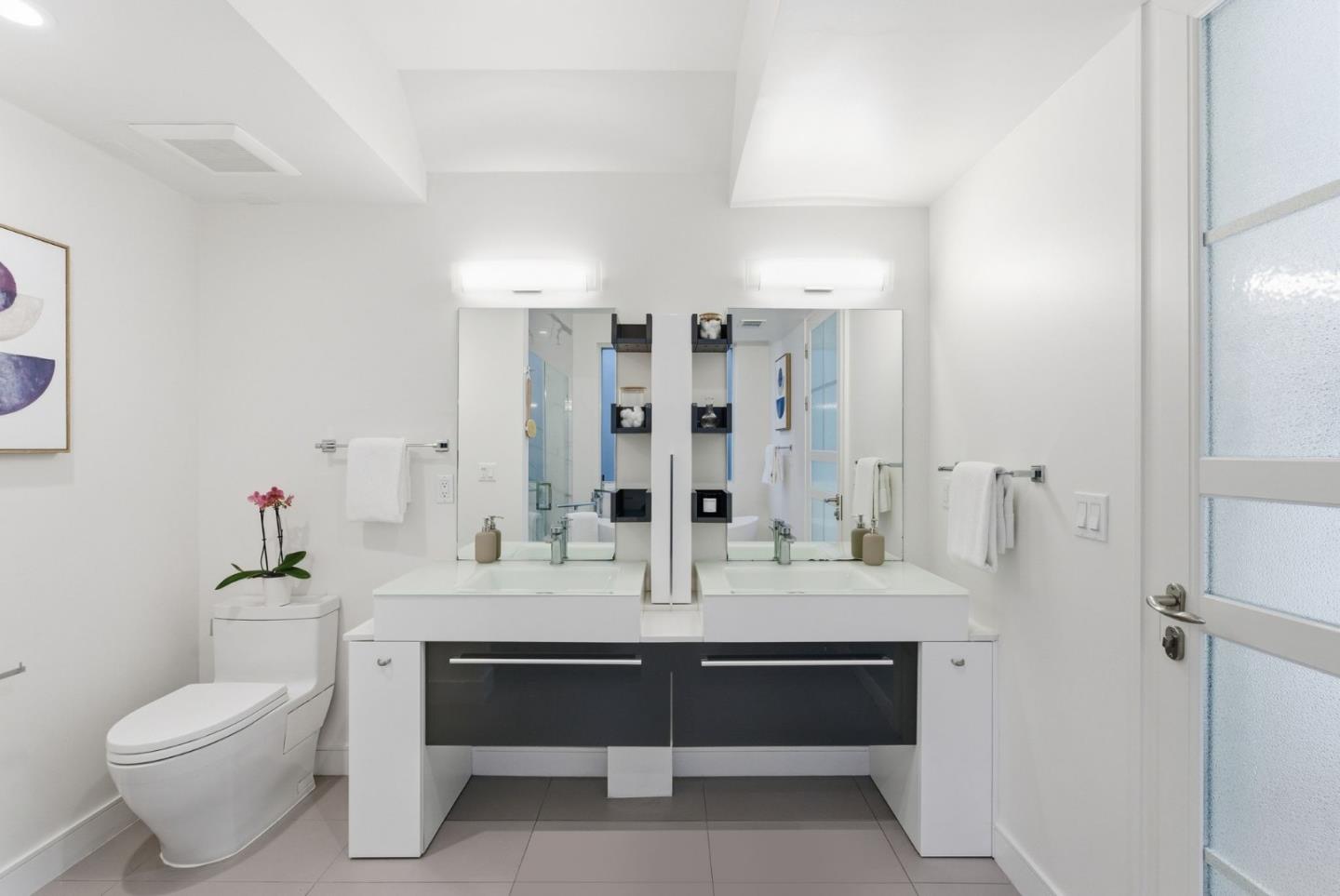 1705 Lawrence Road Santa Clara, CA 95051 - Photo 25 of 45 a bathroom with a double vanity sink toilet and shower