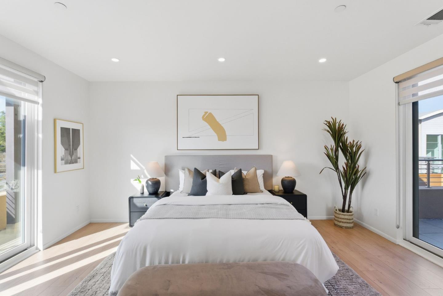 1705 Lawrence Road Santa Clara, CA 95051 - Photo 35 of 45 a bedroom with a large bed and a potted plant