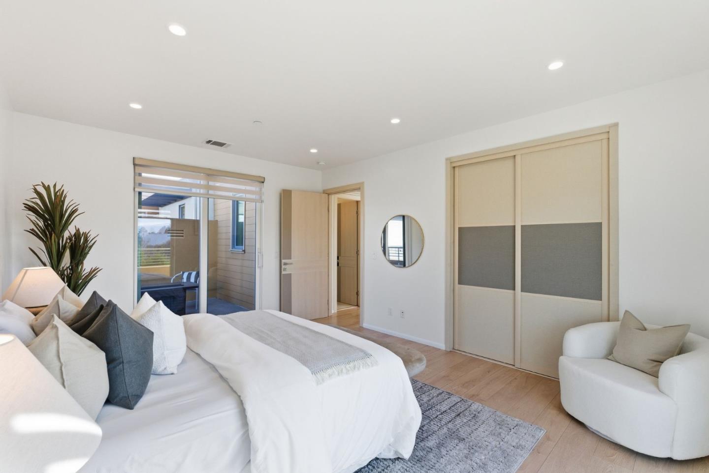 1705 Lawrence Road Santa Clara, CA 95051 - Photo 36 of 45 a bedroom with a large bed and a couch