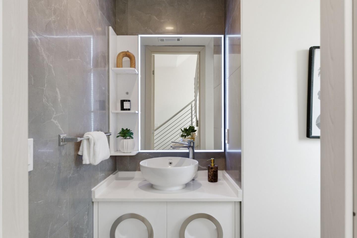 1705 Lawrence Road Santa Clara, CA 95051 - Photo 6 of 45 a bathroom with a sink and a mirror