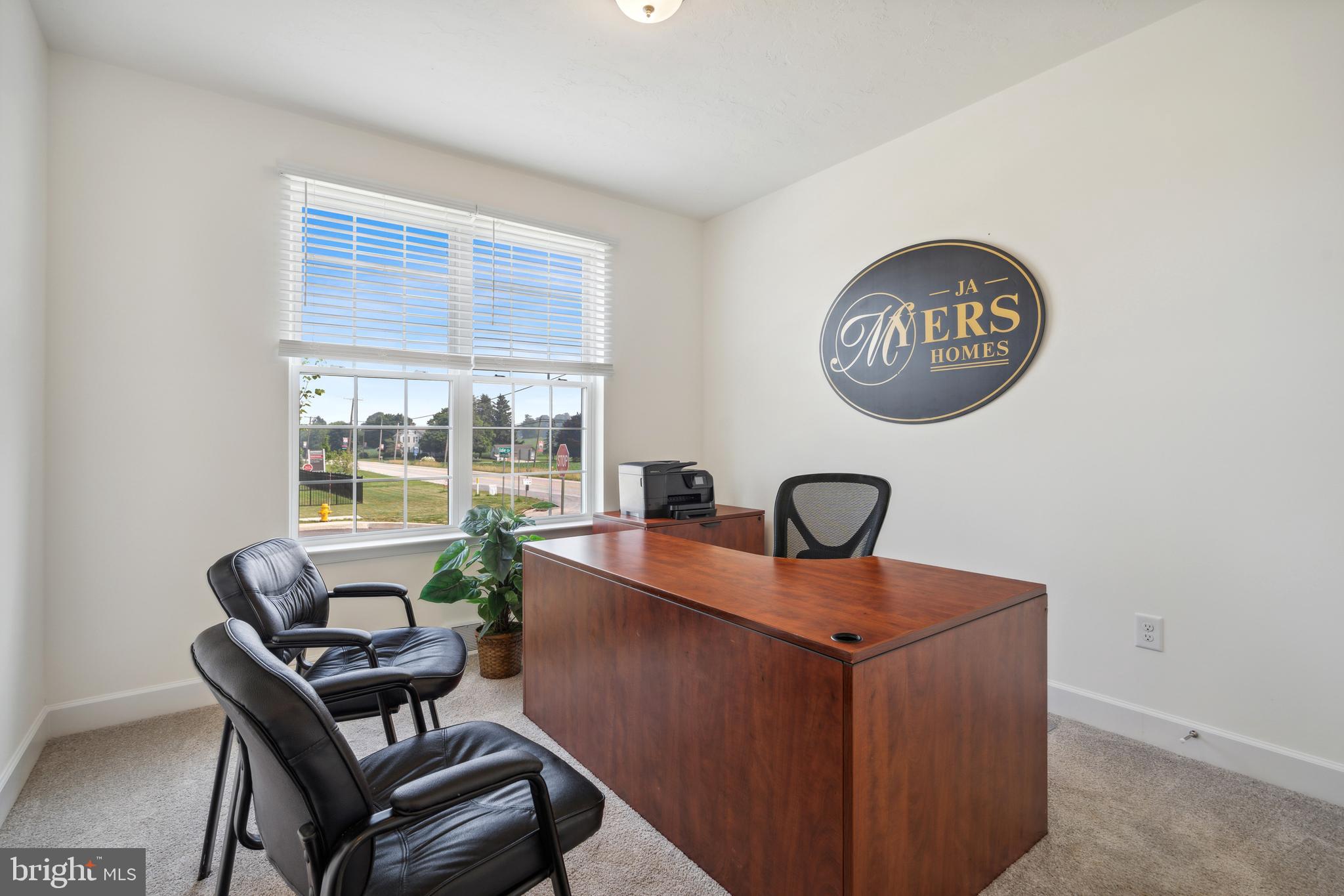12 Antietam Run, Unit 78 Hanover, PA 17331 - Photo 4 of 26 a view of a workspace with a couch