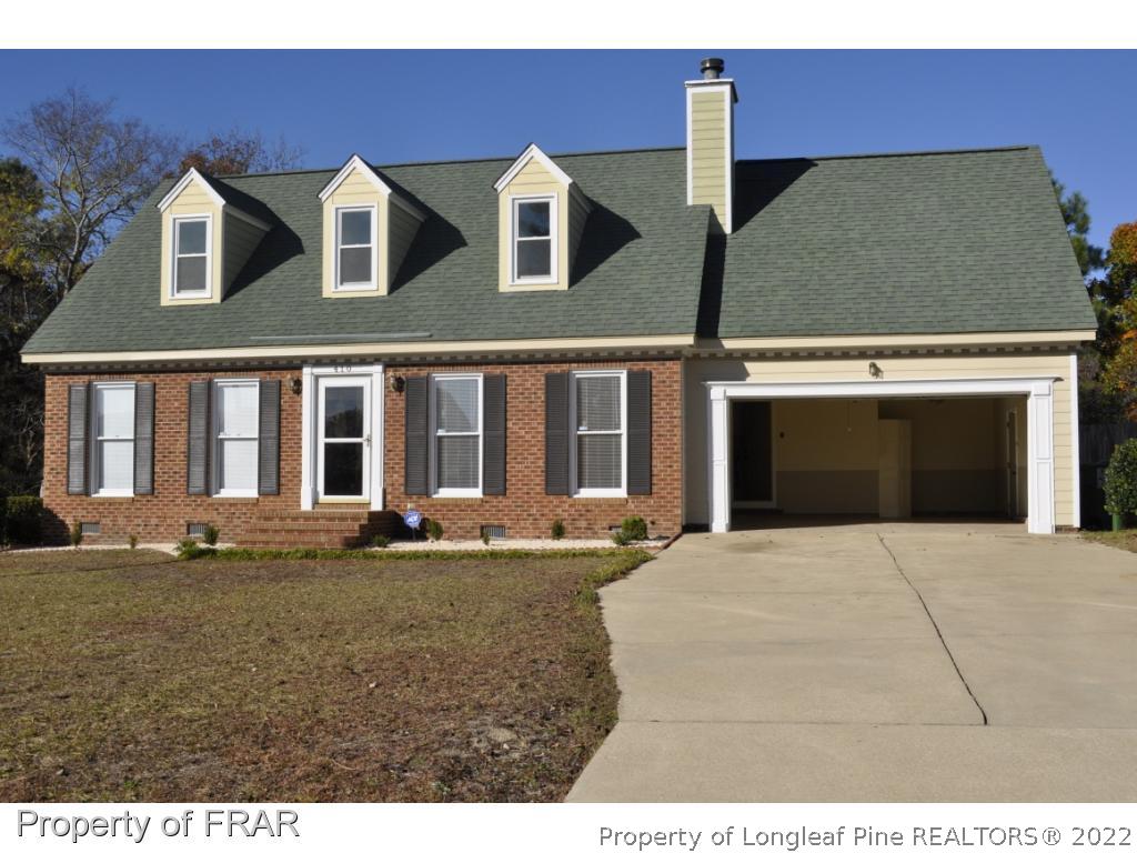 410 Saddle Ridge Road Fayetteville, NC 28311 - Photo 15 of 31 a front view of a house with a yard