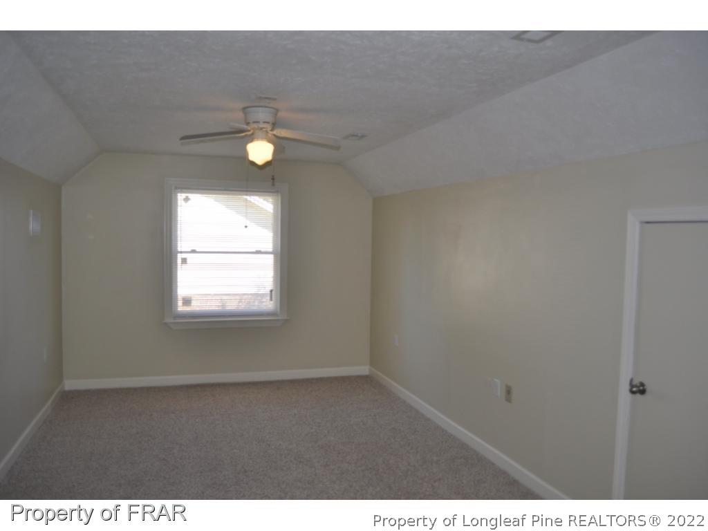 410 Saddle Ridge Road Fayetteville, NC 28311 - Photo 17 of 31 a view of an empty room and window