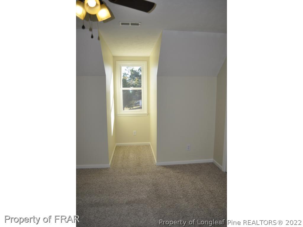 410 Saddle Ridge Road Fayetteville, NC 28311 - Photo 22 of 31 a picture of a bathroom with a sink and a mirror