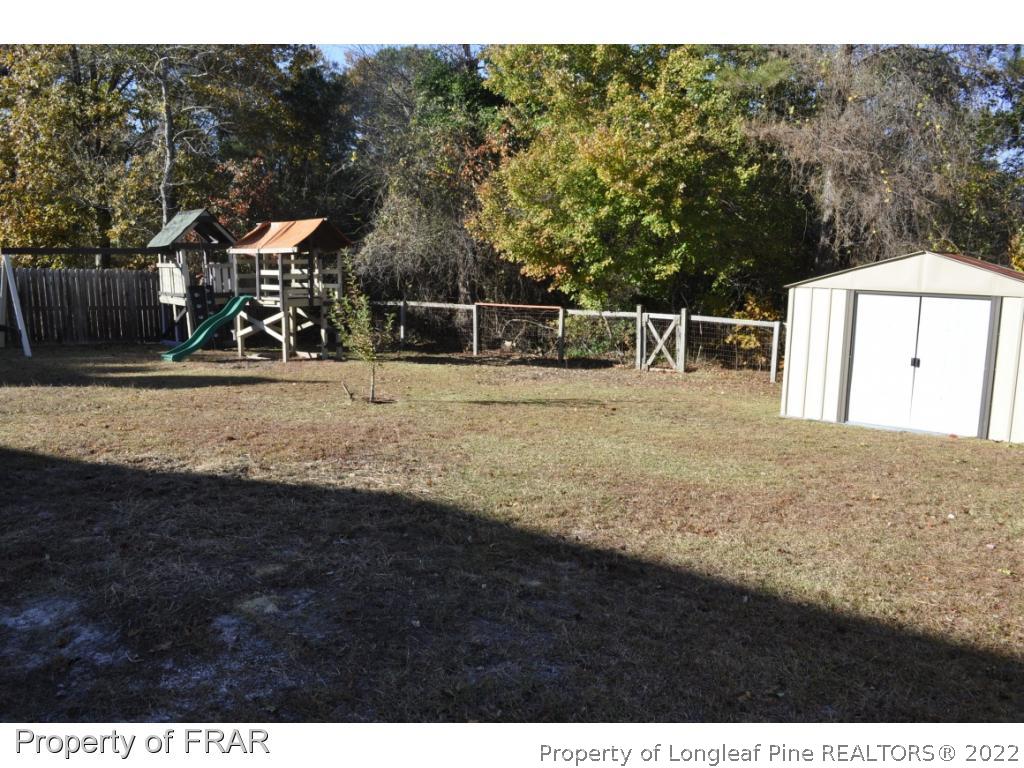 410 Saddle Ridge Road Fayetteville, NC 28311 - Photo 29 of 31 a view of a backyard