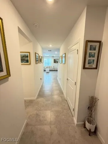 a view of a hallway with closet