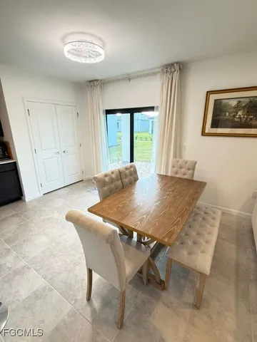 a workspace with furniture and window