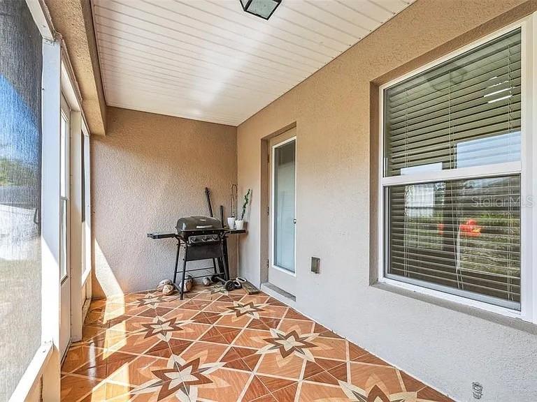 404 Rio Grande Court Poinciana, FL 34759 - Photo 21 of 21 a bedroom with furniture and window