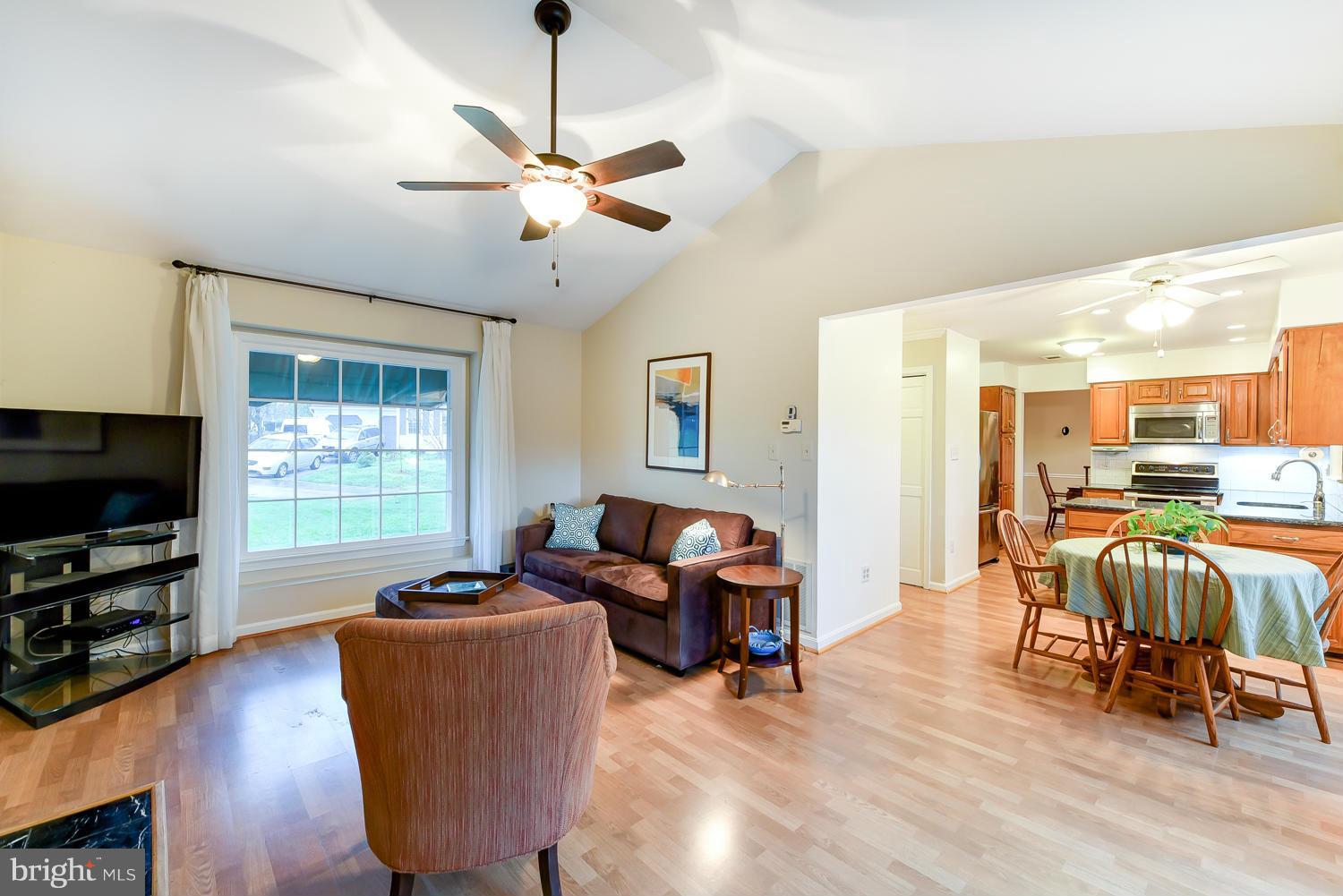 7434 Ridge Road Springfield, VA 22153 - Photo 14 of 30 a living room with furniture and a flat screen tv