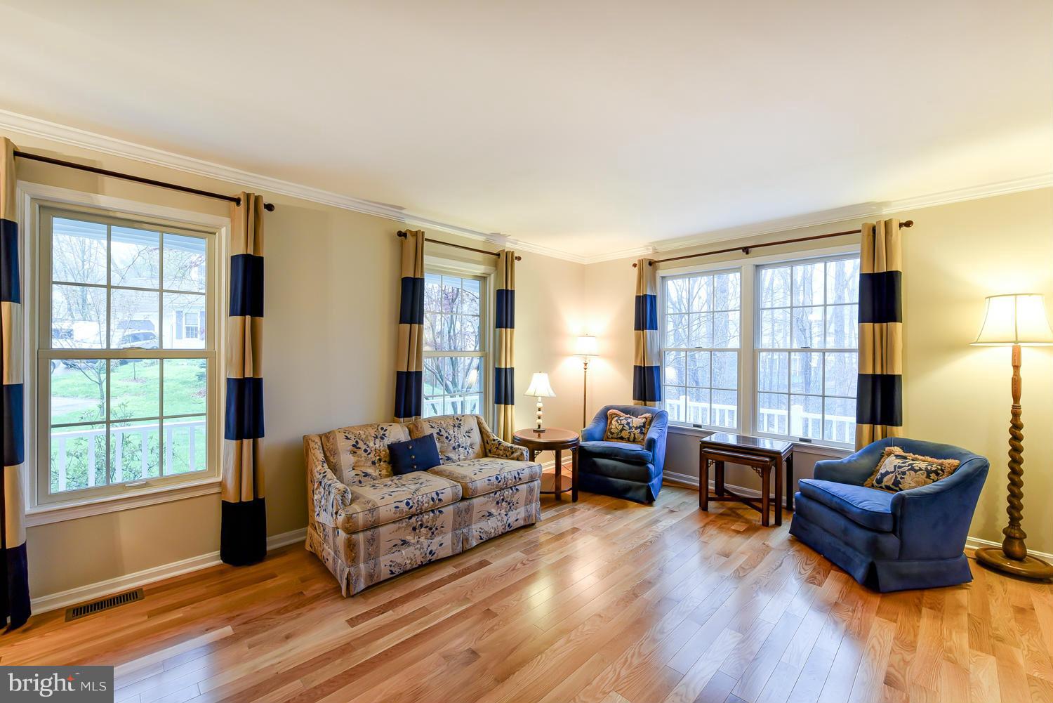 7434 Ridge Road Springfield, VA 22153 - Photo 3 of 30 a living room with furniture and a large window