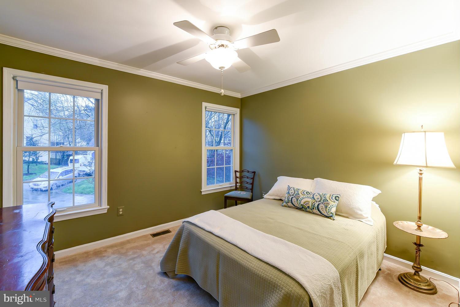 7434 Ridge Road Springfield, VA 22153 - Photo 22 of 30 a bedroom with a bed and window