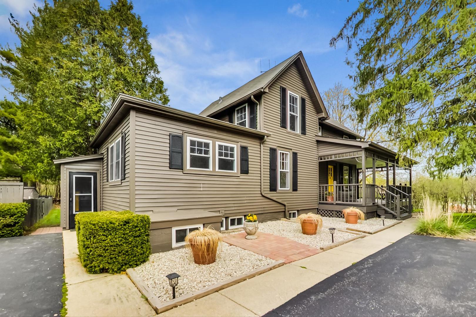 20792 Illinois Rte 59 Barrington, IL 60010 - Photo 1 of 35 a front view of a house with patio