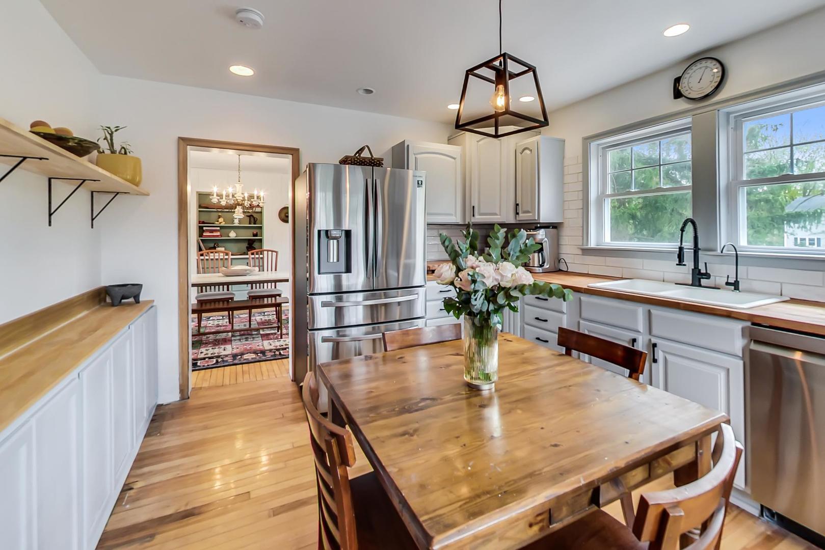 20792 Illinois Rte 59 Barrington, IL 60010 - Photo 14 of 35 a dining table and chairs in the kitchen