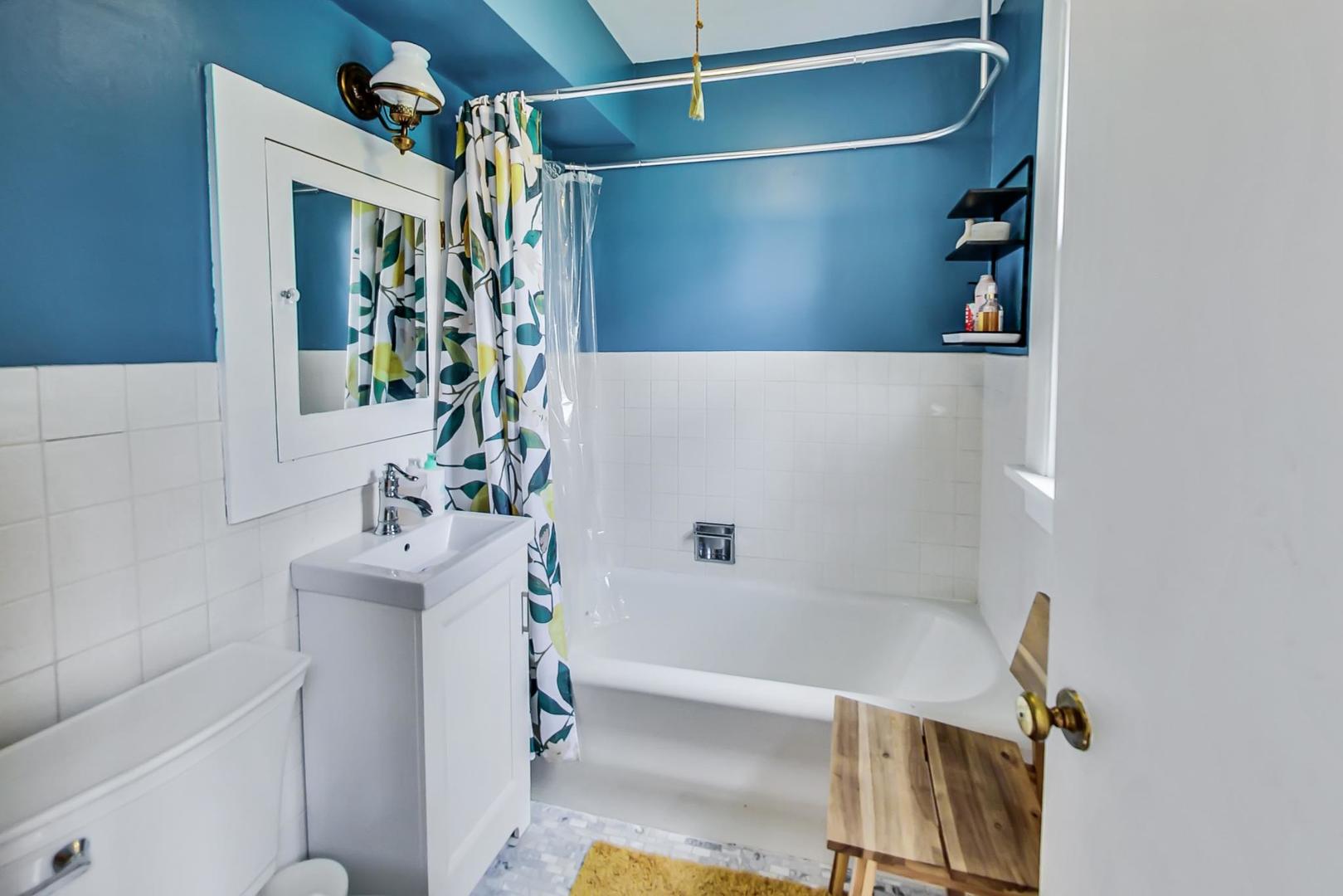 20792 Illinois Rte 59 Barrington, IL 60010 - Photo 16 of 35 a bathroom with a bathtub and a sink