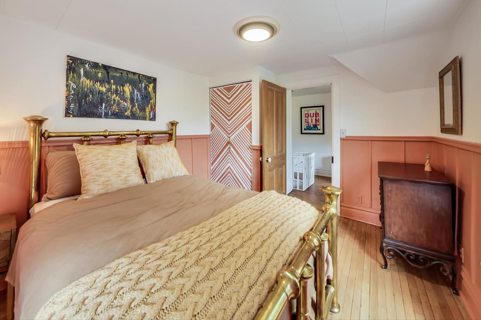 20792 Illinois Rte 59 Barrington, IL 60010 - Photo 24 of 35 a bedroom with a bed and a flat screen tv