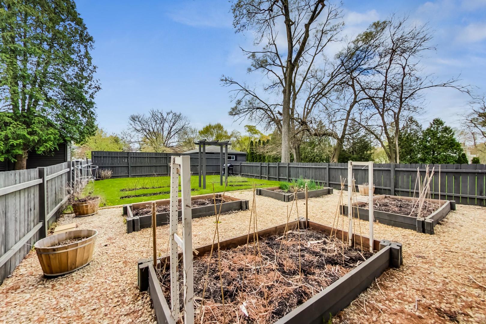 20792 Illinois Rte 59 Barrington, IL 60010 - Photo 34 of 35 a view of a patio with two chairs and a table