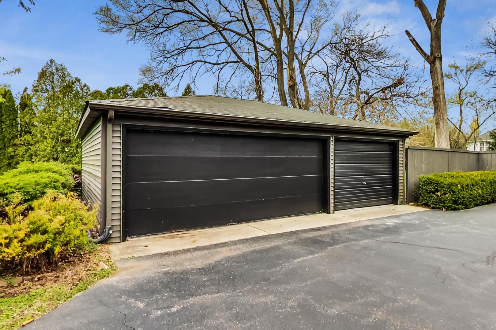 20792 Illinois Rte 59 Barrington, IL 60010 - Photo 35 of 35 a small house with a outdoor space