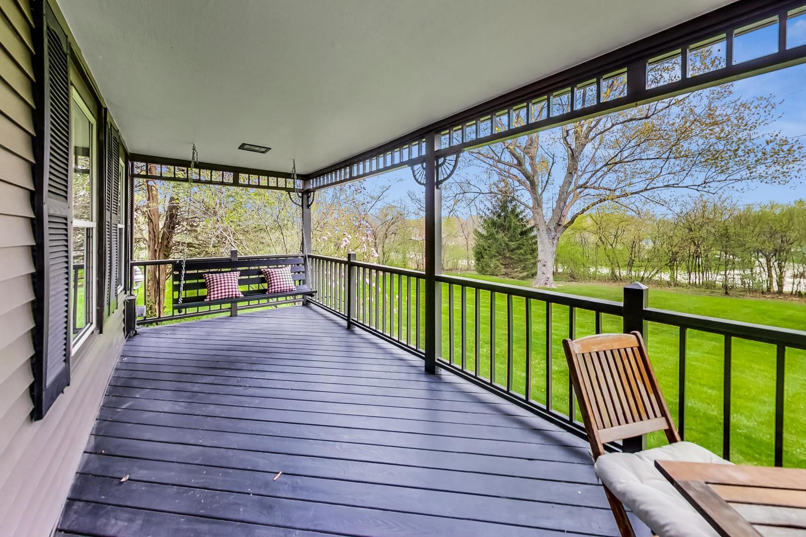 20792 Illinois Rte 59 Barrington, IL 60010 - Photo 4 of 35 a view of a porch with wooden floor