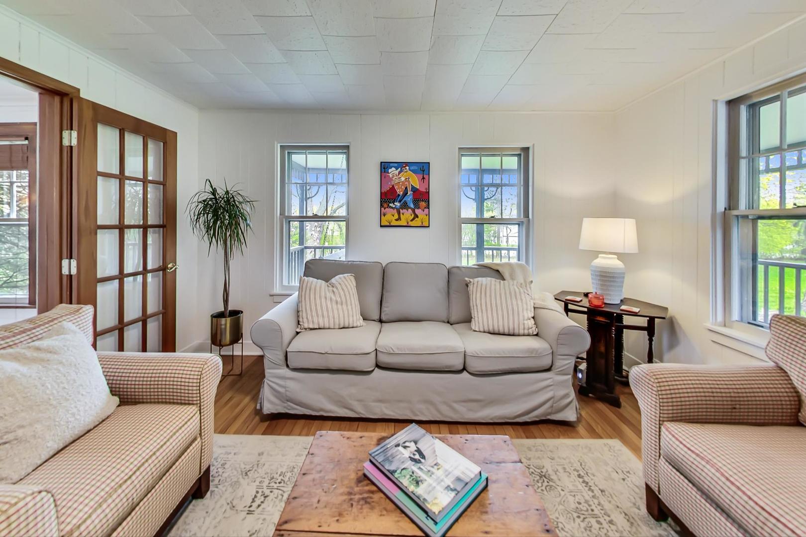 20792 Illinois Rte 59 Barrington, IL 60010 - Photo 6 of 35 a living room with furniture and a lamp