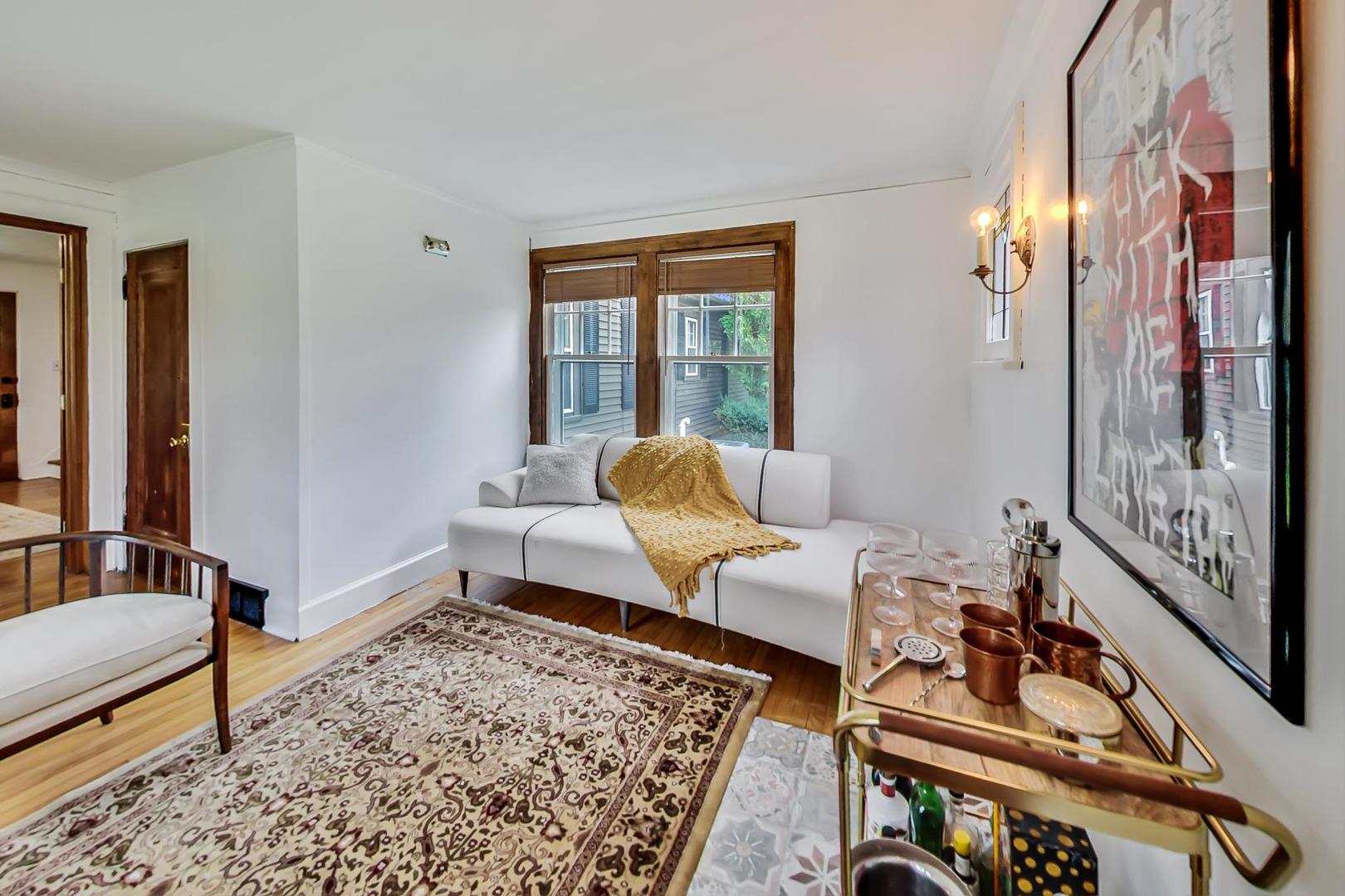 20792 Illinois Rte 59 Barrington, IL 60010 - Photo 8 of 35 a living room with furniture and a rug