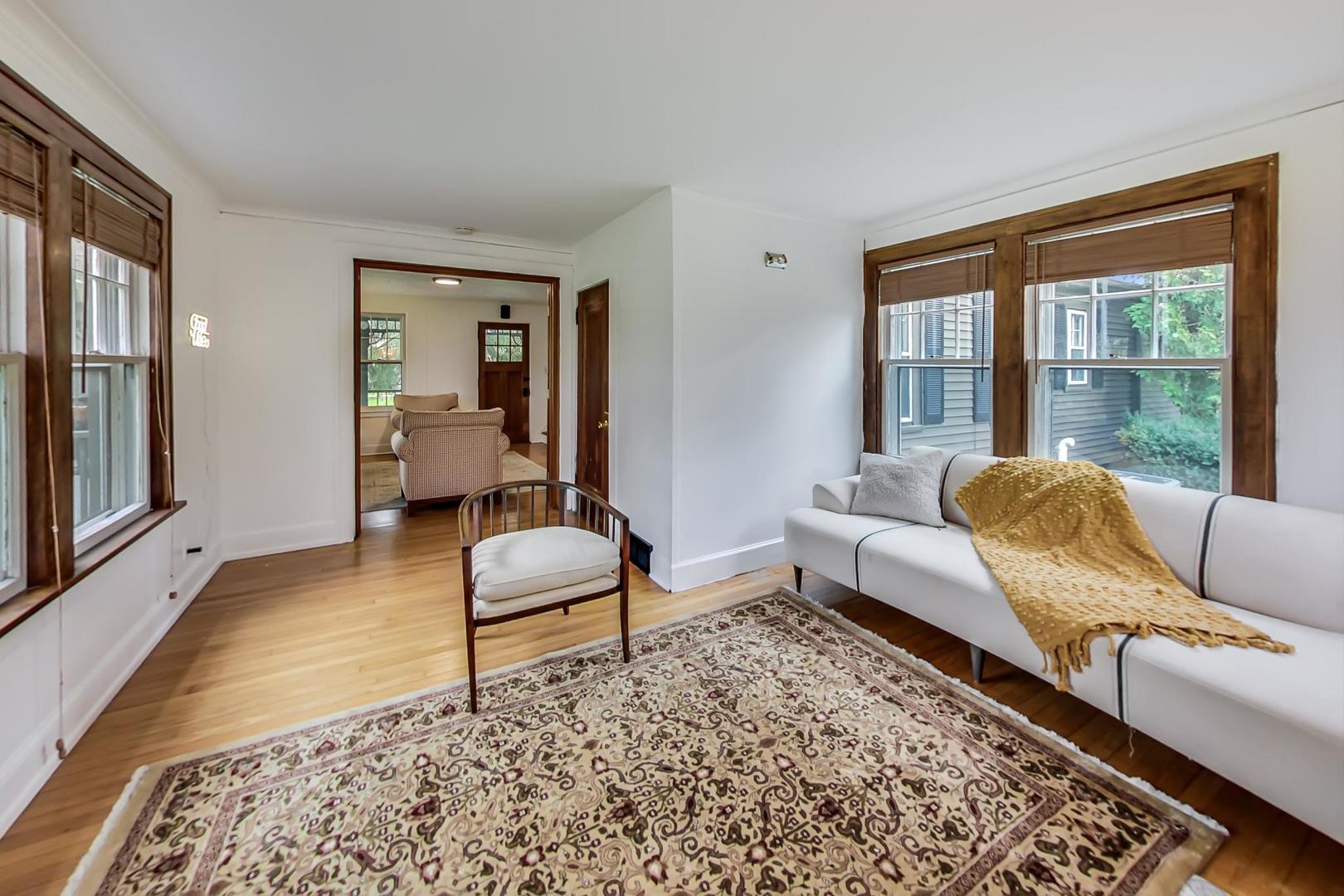 20792 Illinois Rte 59 Barrington, IL 60010 - Photo 9 of 35 a living room with furniture and a rug